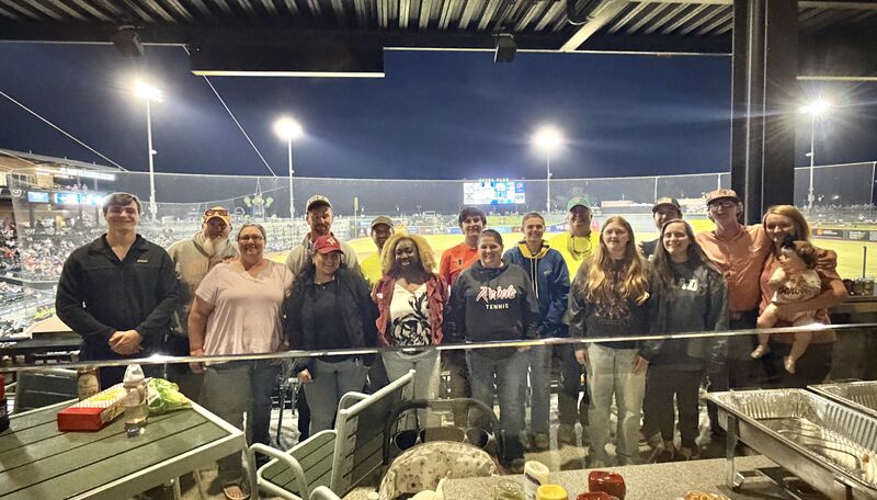 Abraham Land Surveying crew gathered for a group photo at the Columbia Fireflies ballpark during the first company night